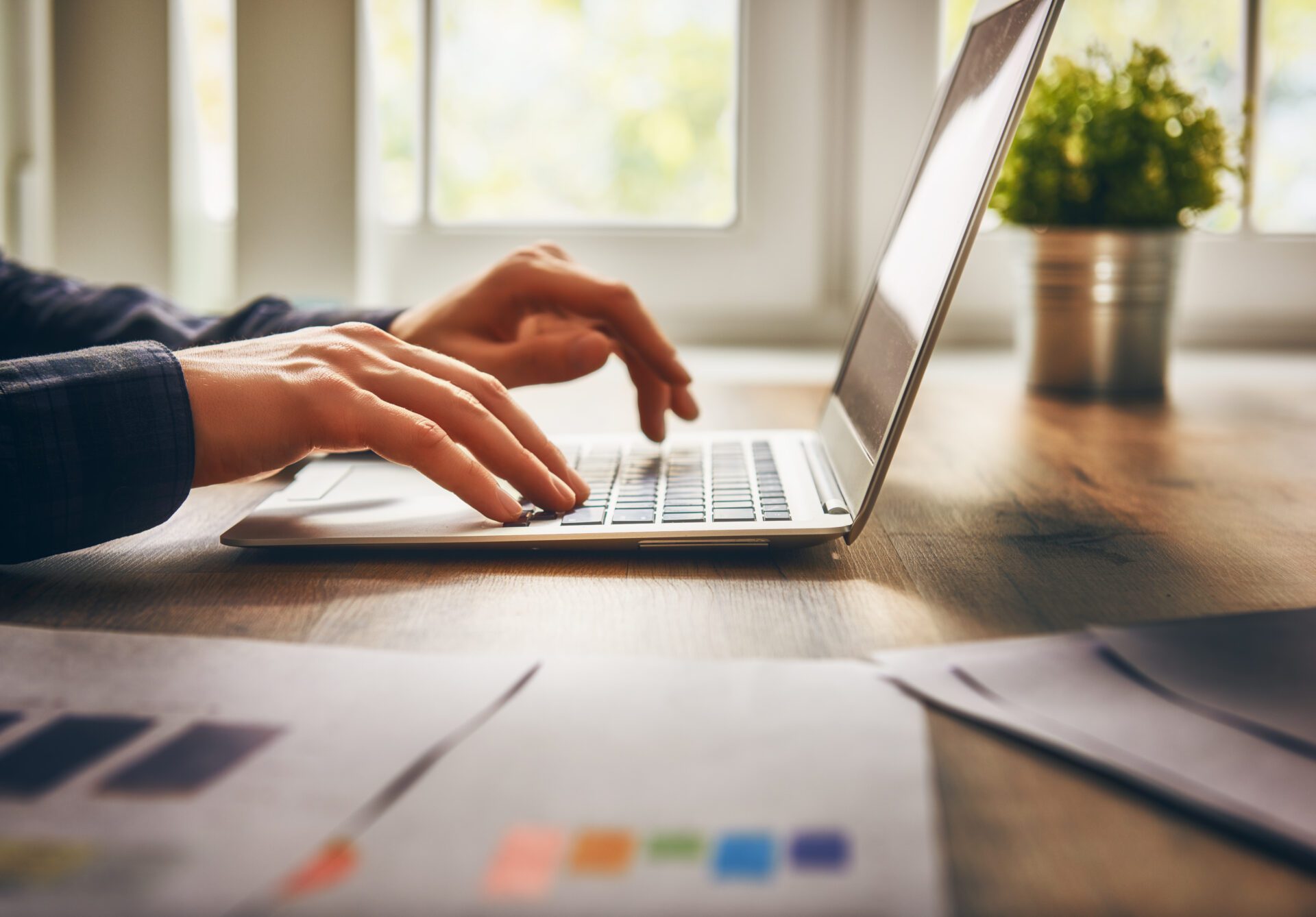 businessman using laptop Internal Financial Controls